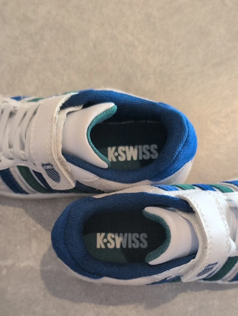 KSWISS Kids White Sneakers with Blue & Green Stripe Accents